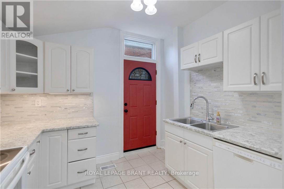 95 Queen Street, Brantford, ON - Indoor Photo Showing Kitchen With Double Sink