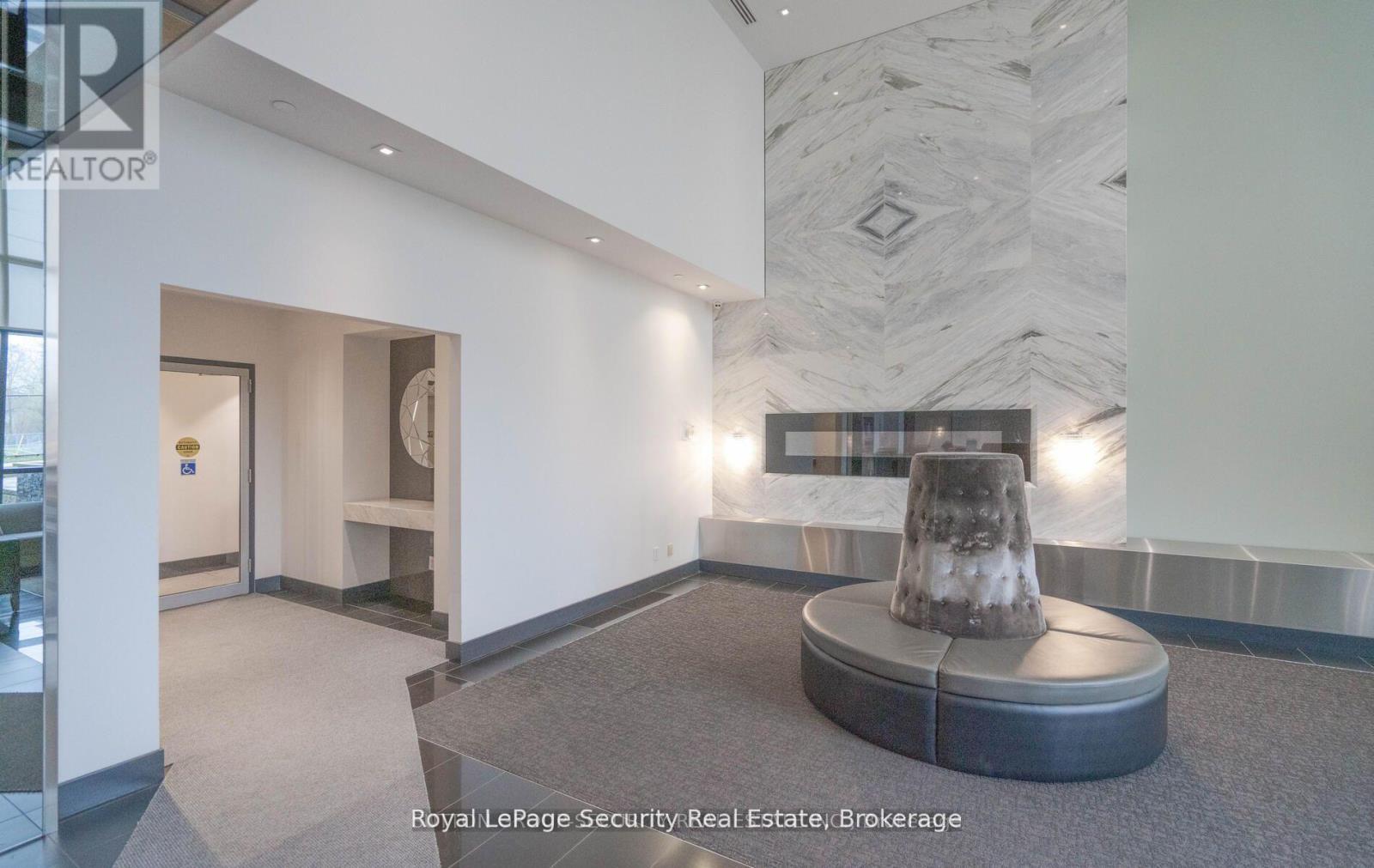 328 - 399 Spring Garden Avenue, Toronto, ON - Indoor Photo Showing Other Room With Fireplace