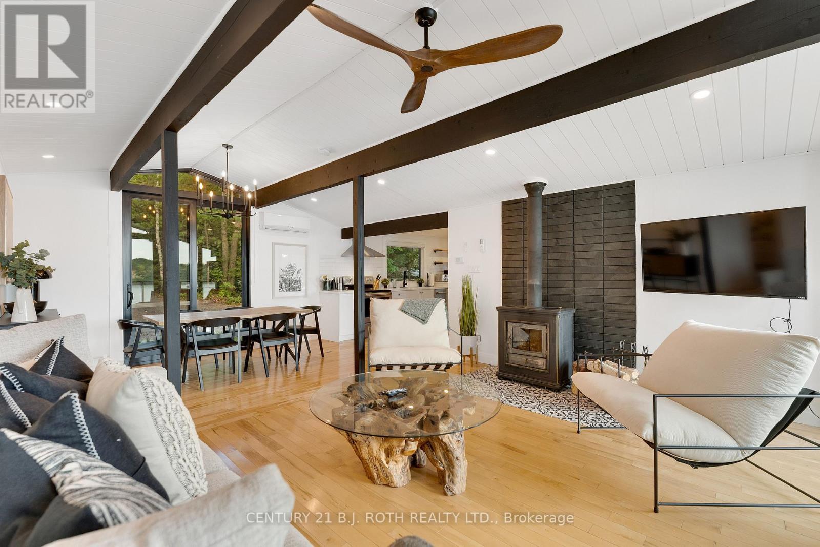334 Stewart Lake Road, Georgian Bay, ON - Indoor Photo Showing Living Room With Fireplace