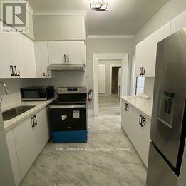 106 - 206 Carlton Street, Toronto, ON - Indoor Photo Showing Kitchen