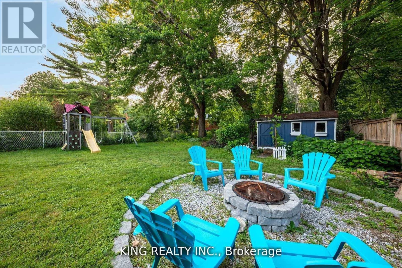 602 Champlain Road, Tiny, ON - Outdoor With Backyard