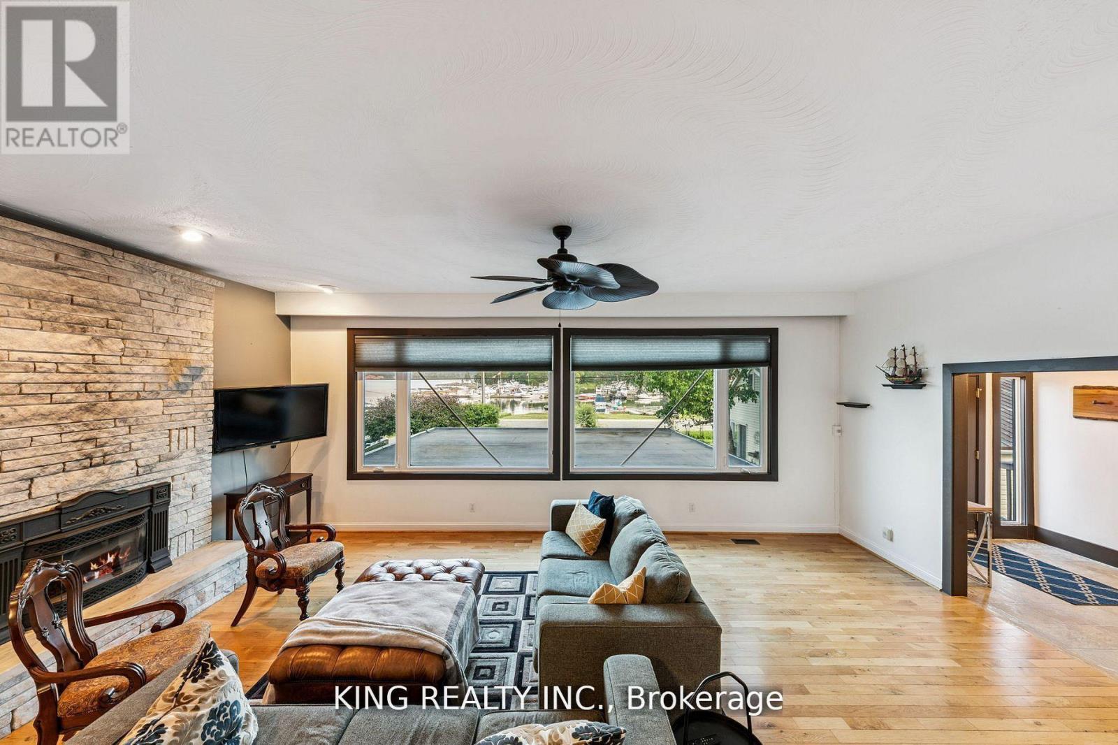 602 Champlain Road, Tiny, ON - Indoor Photo Showing Living Room With Fireplace