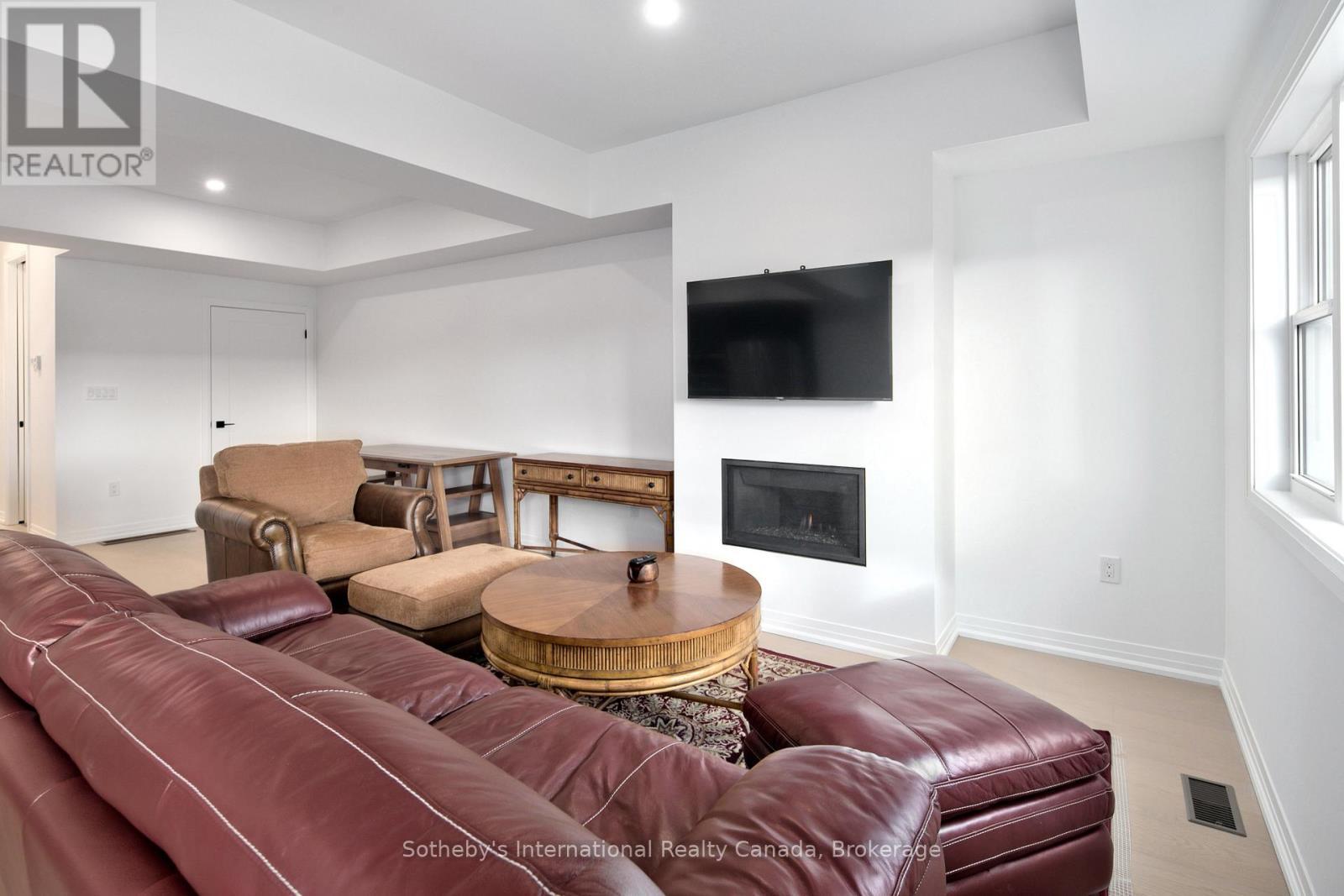 174 Equality Drive, Meaford, ON - Indoor Photo Showing Living Room With Fireplace