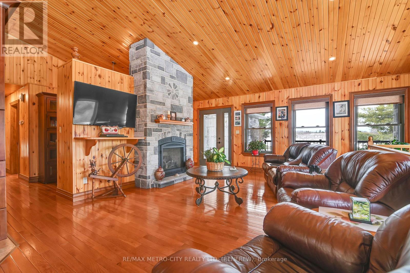 3280 Burnstown Road, Horton, ON - Indoor Photo Showing Living Room With Fireplace