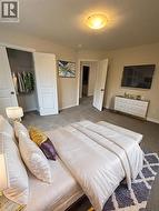 Bedroom featuring a closet and carpet -