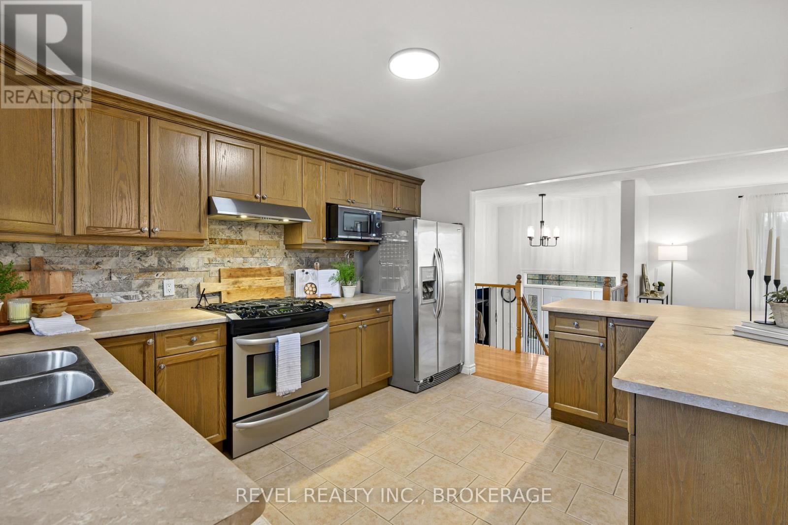 3826 Stage Coach Road, Frontenac (Frontenac South), ON - Indoor Photo Showing Kitchen With Double Sink