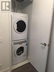2012 - 181 Dundas Street E, Toronto, ON - Indoor Photo Showing Laundry Room
