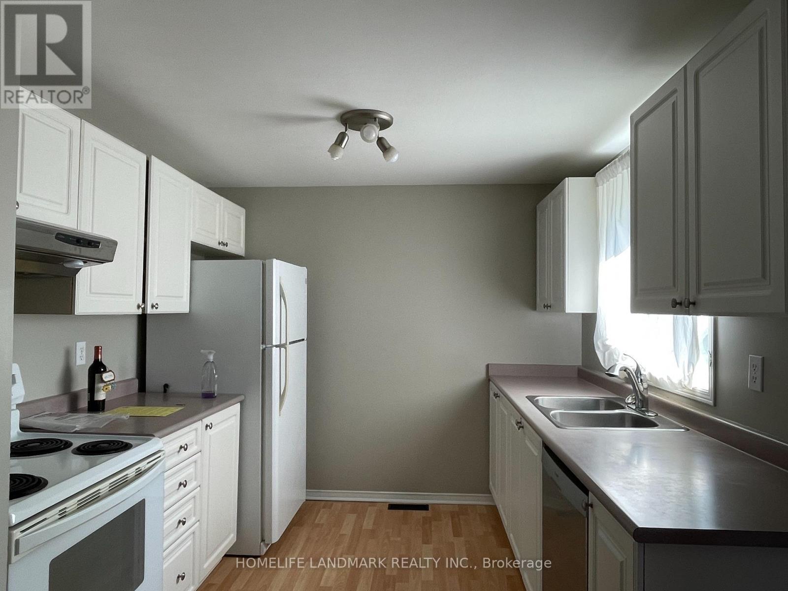 Main - 53 Garibaldi Drive, Barrie, ON - Indoor Photo Showing Kitchen With Double Sink