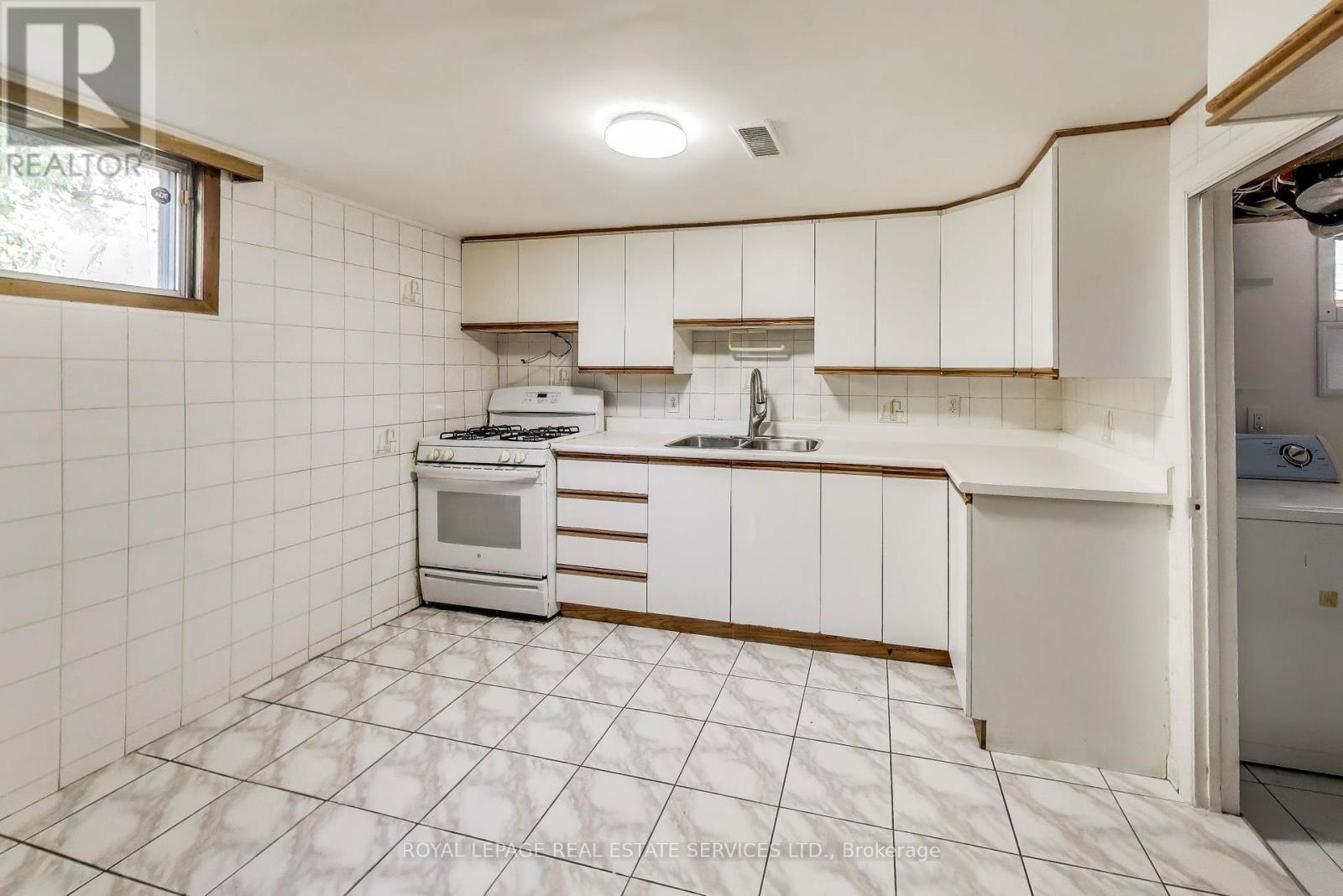 251 Driftwood Avenue, Toronto, ON - Indoor Photo Showing Kitchen With Double Sink