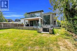 Rear elevation W/large porch and private backyard -