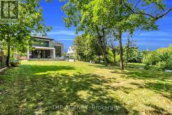 Rear elevation W/large porch and private backyard -