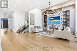 Family Room w/large window and built-in TV wall -