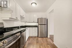 Kitchen with 3 stainless steel appliances -