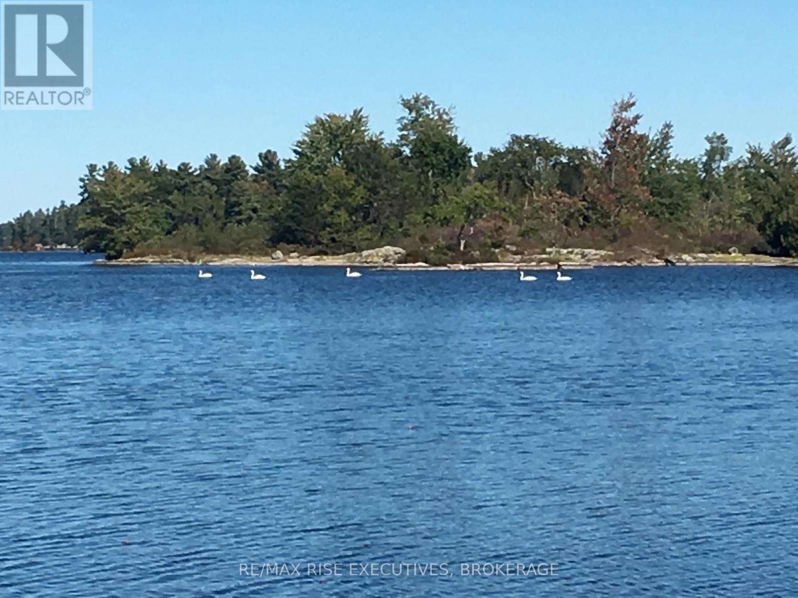 5065 Lower Round Lake Road, Frontenac (Frontenac South), ON - Outdoor With Body Of Water With View