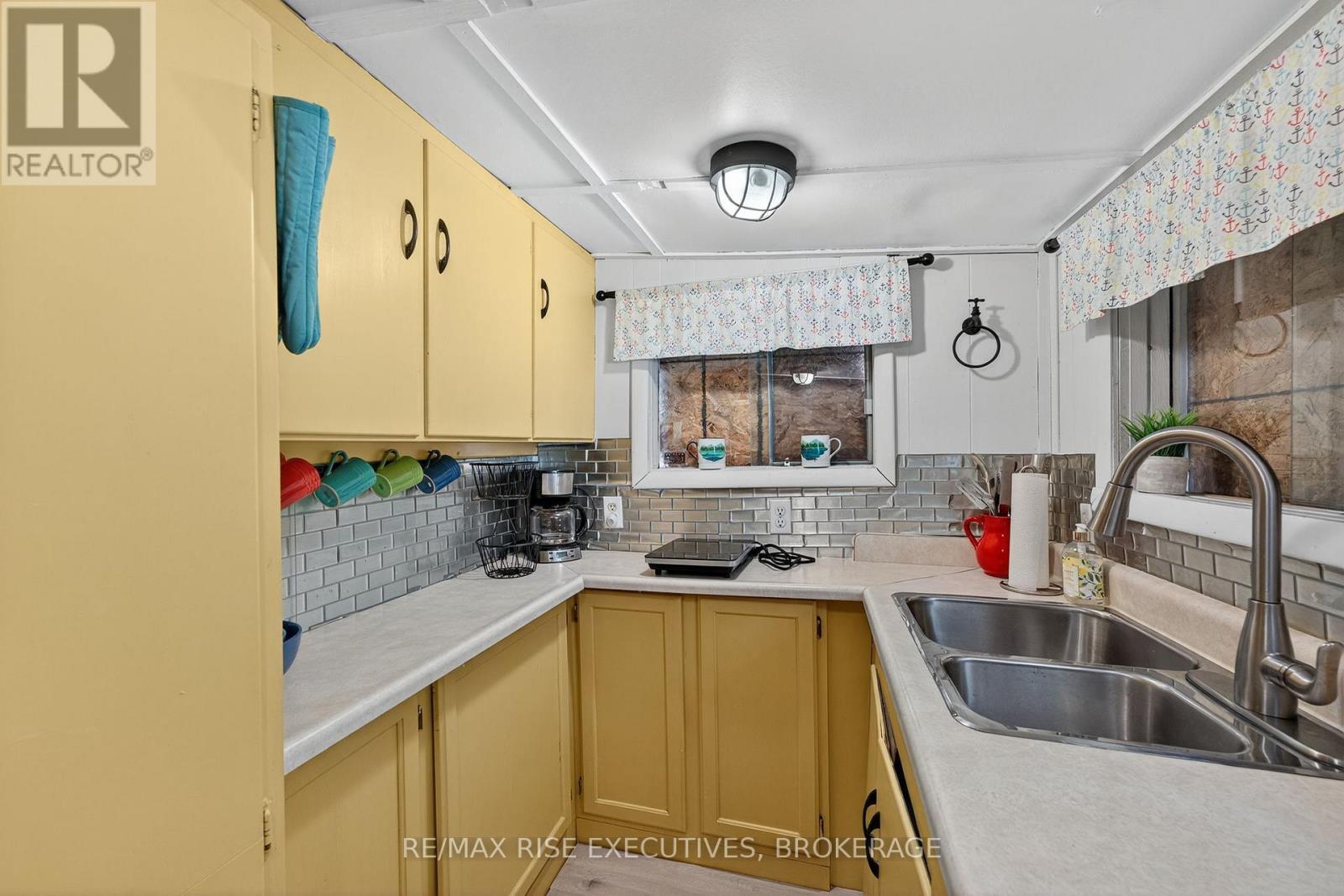 5065 Lower Round Lake Road, Frontenac (Frontenac South), ON - Indoor Photo Showing Kitchen With Double Sink