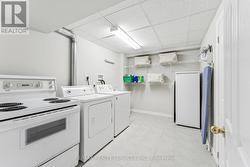 Basement Laundry Room with Storage Closet -