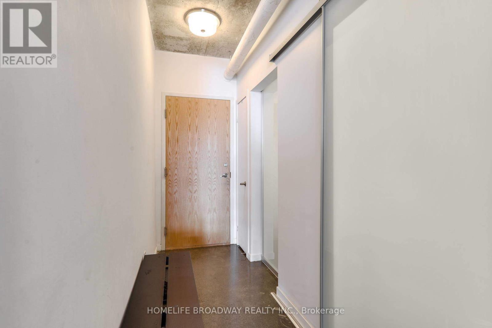 Entrance Way and Den Sliding Doors - 2012 - 150 Sudbury Street, Toronto, ON - Indoor Photo Showing Other Room