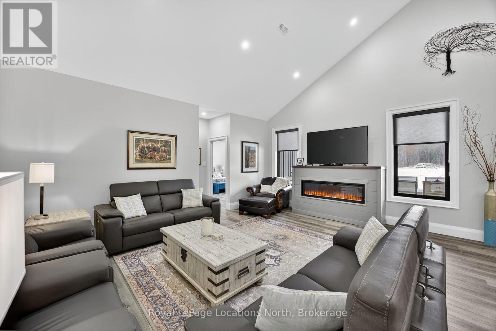 3511 Rainbow Valley Road W, Springwater, ON - Indoor Photo Showing Living Room With Fireplace