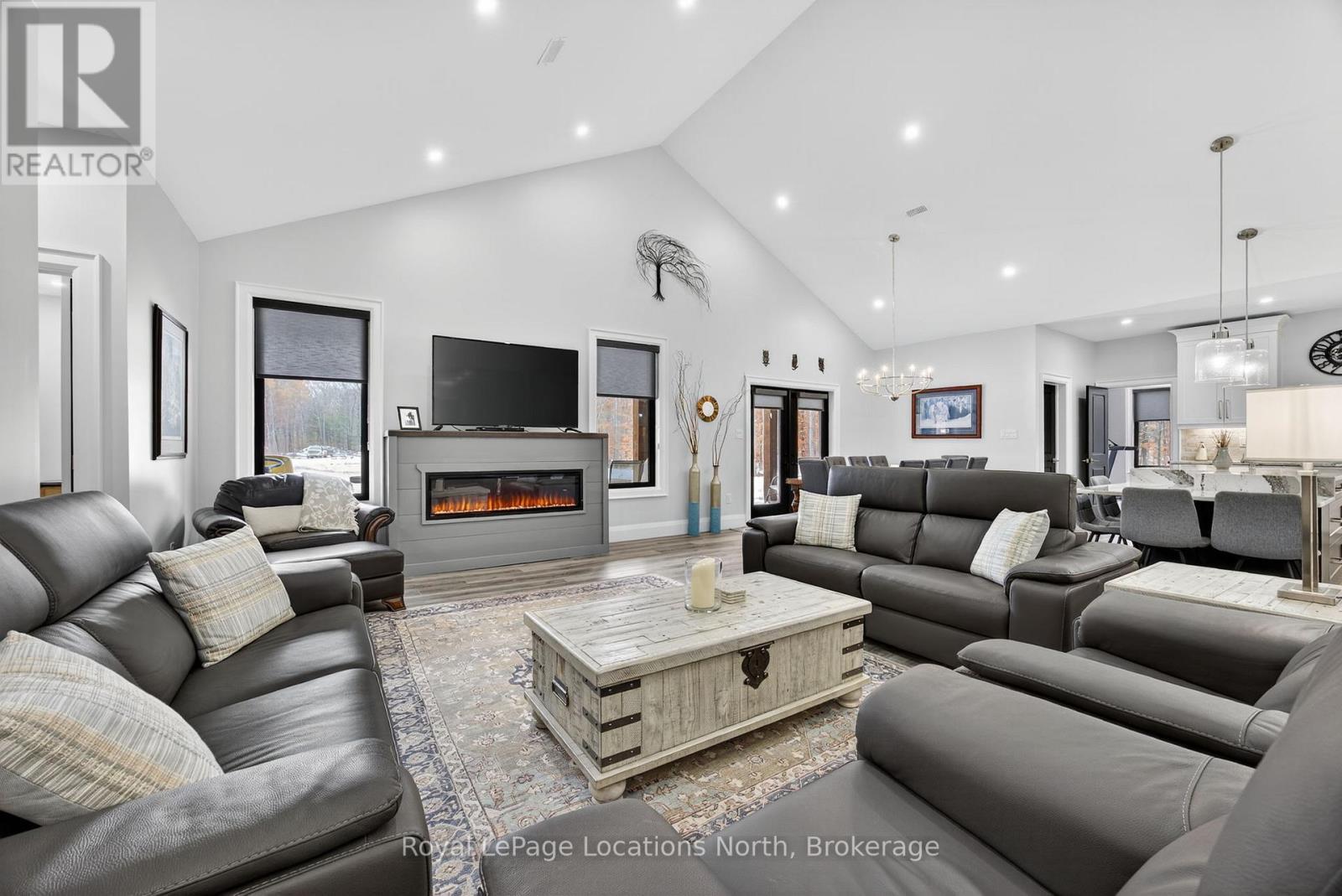 3511 Rainbow Valley Road W, Springwater, ON - Indoor Photo Showing Living Room With Fireplace