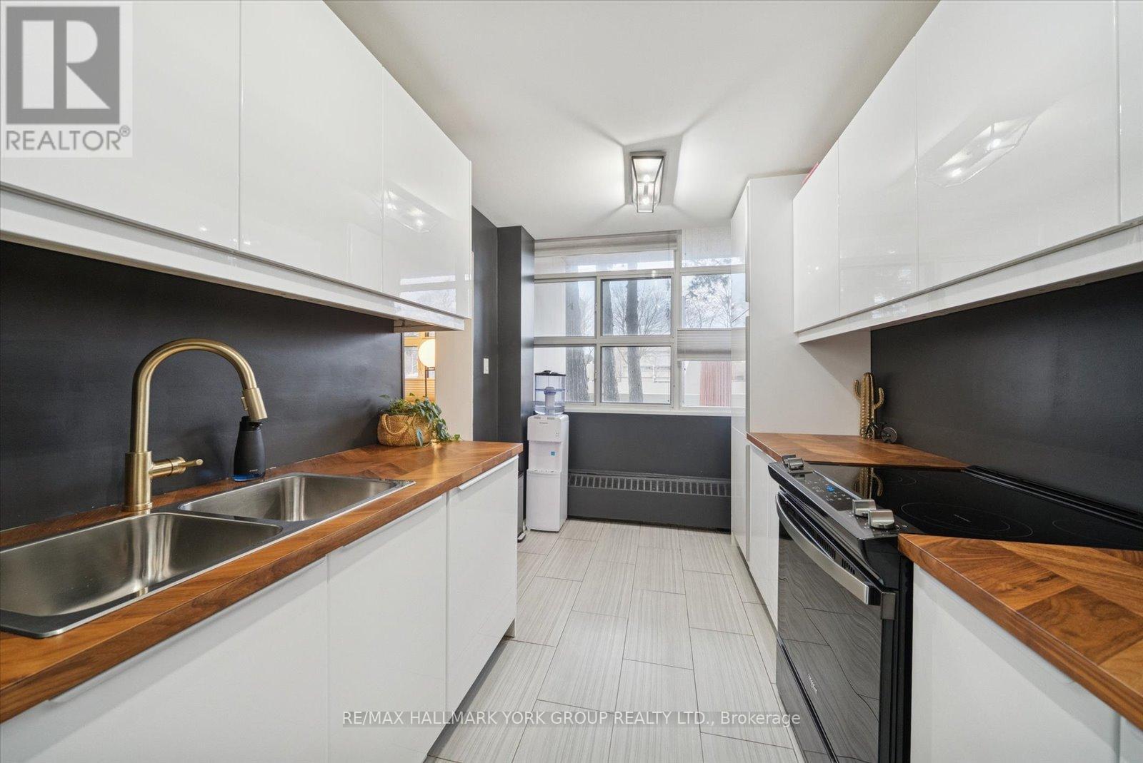 103 - 715 Don Mills Road, Toronto, ON - Indoor Photo Showing Kitchen With Double Sink