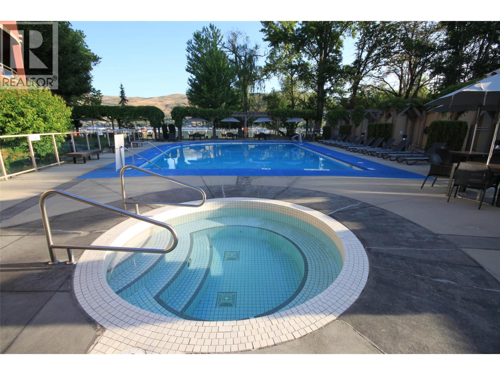 7343 Okanagan Landing Road Unit# 2204, Vernon, BC - Outdoor With In Ground Pool With Backyard