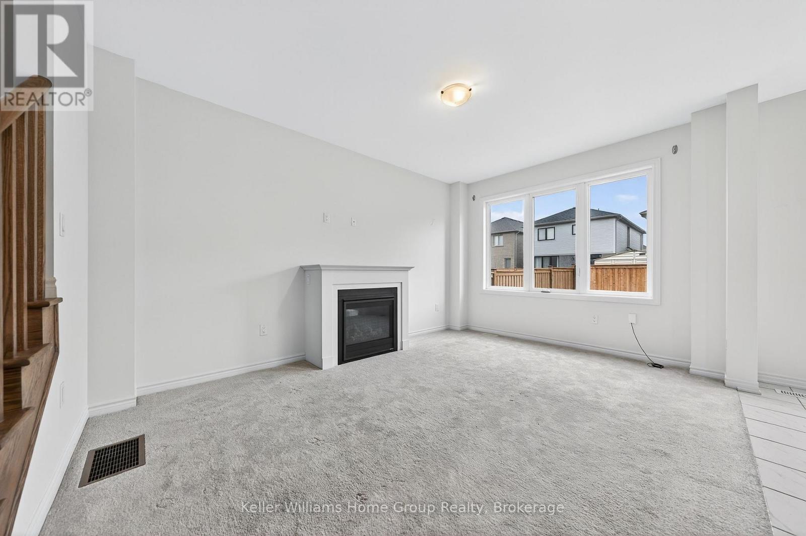 27 Harpin Way W, Centre Wellington (Fergus), ON - Indoor With Fireplace