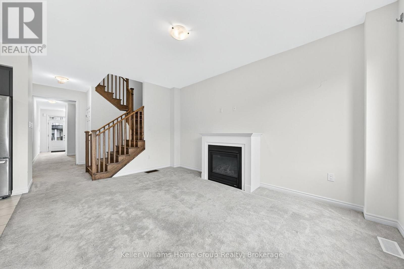 27 Harpin Way W, Centre Wellington (Fergus), ON - Indoor With Fireplace