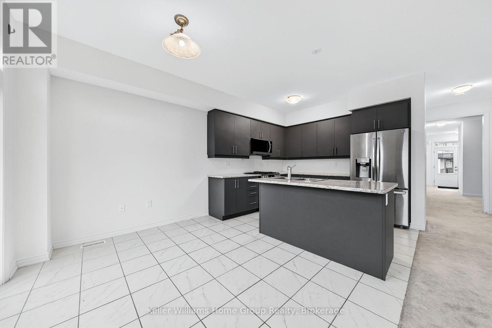 27 Harpin Way W, Centre Wellington (Fergus), ON - Indoor Photo Showing Kitchen