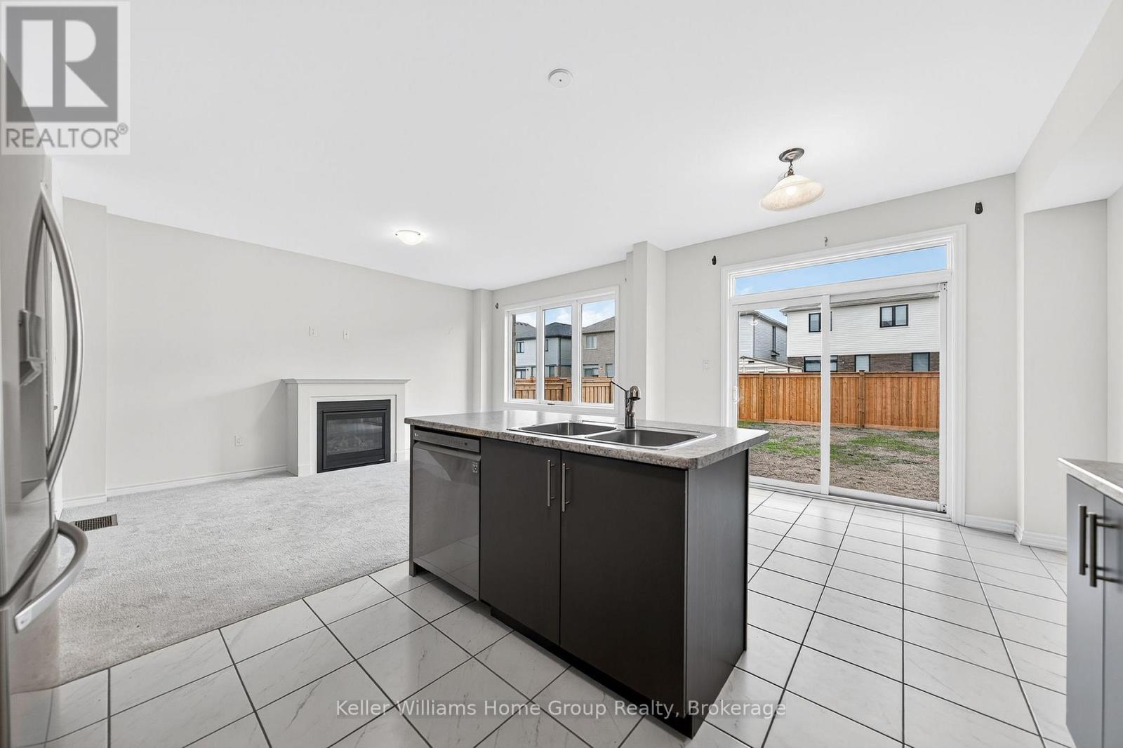 27 Harpin Way W, Centre Wellington (Fergus), ON - Indoor Photo Showing Kitchen With Double Sink