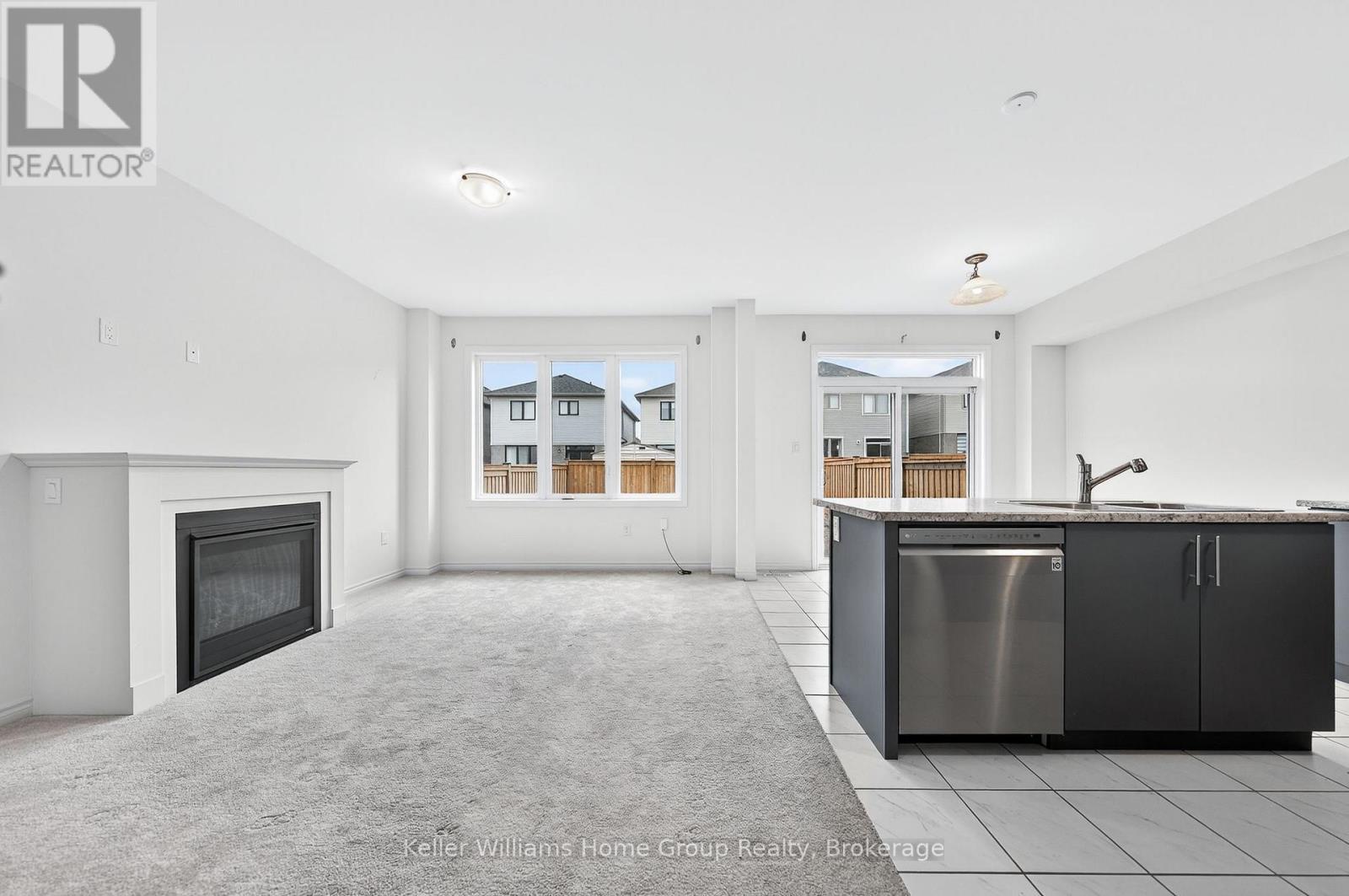 27 Harpin Way W, Centre Wellington (Fergus), ON - Indoor With Fireplace