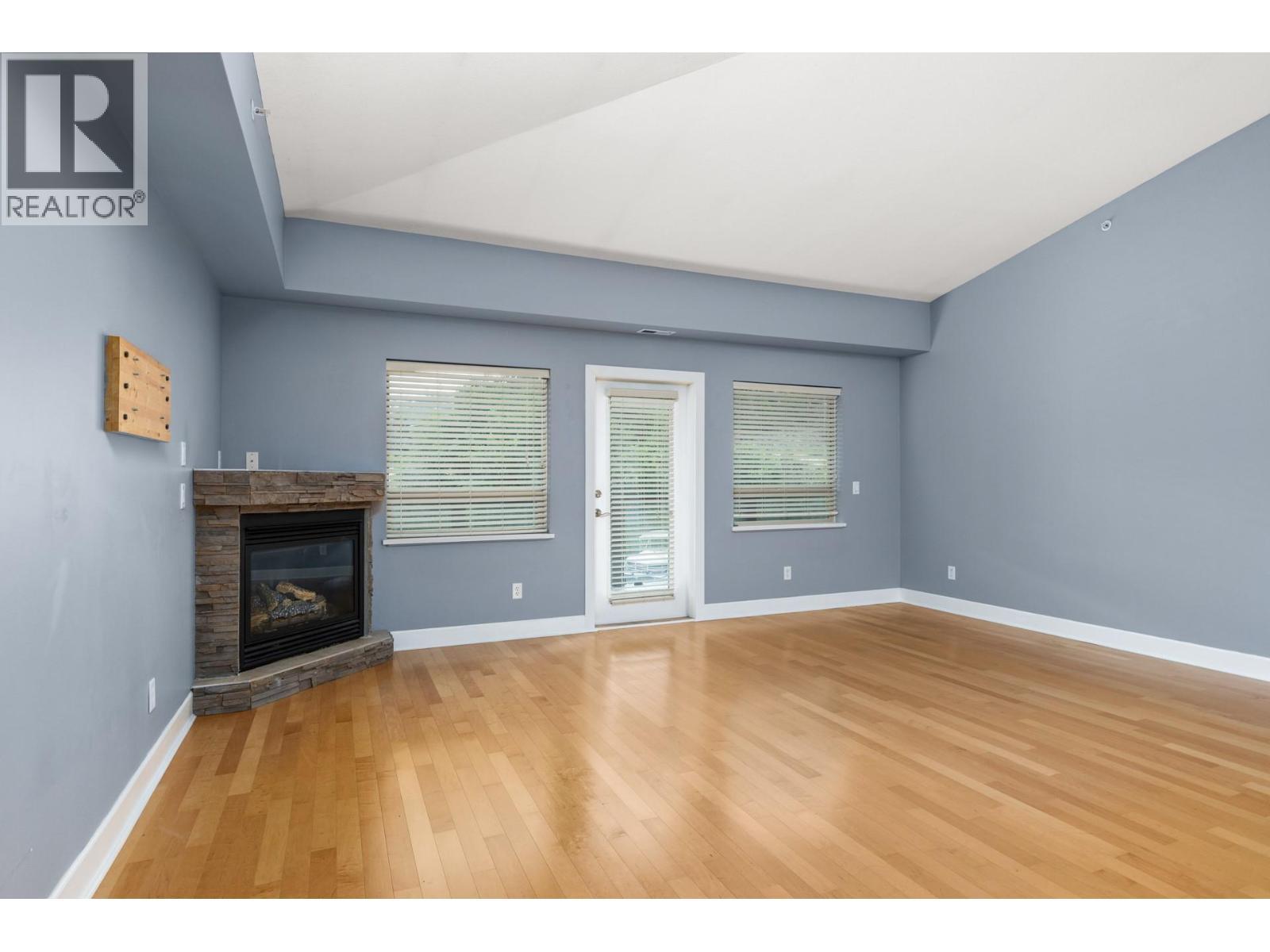 3996 Beach Avenue Unit# 335, Peachland, BC - Indoor With Fireplace