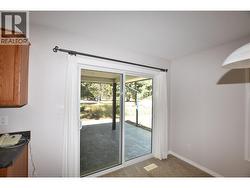 sliders from dining are to covered back patio -