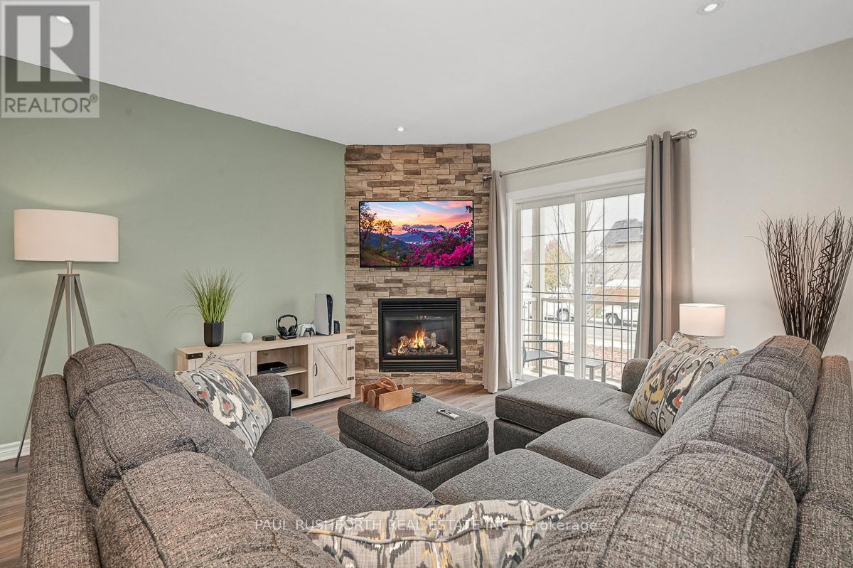Living Room - 2 - 195 Bourdeau Boulevard, The Nation, ON - Indoor Photo Showing Living Room With Fireplace