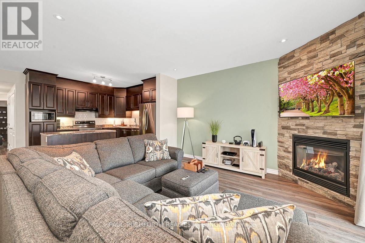 Living Room - 2 - 195 Bourdeau Boulevard, The Nation, ON - Indoor Photo Showing Living Room With Fireplace