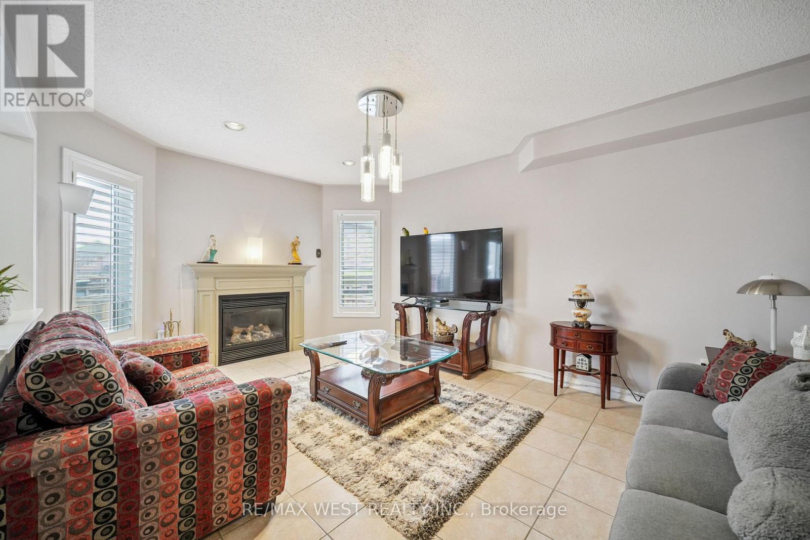 65 Kingly Crest Way, Vaughan, ON - Indoor Photo Showing Living Room With Fireplace