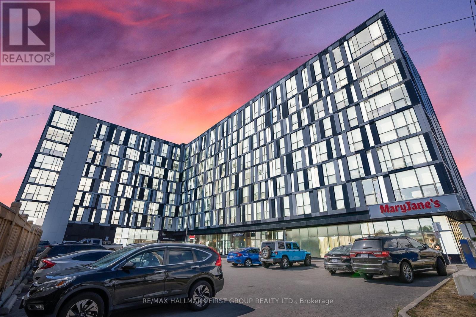 709 - 1900 Simcoe Street N, Oshawa, ON - Photo Showing Garage