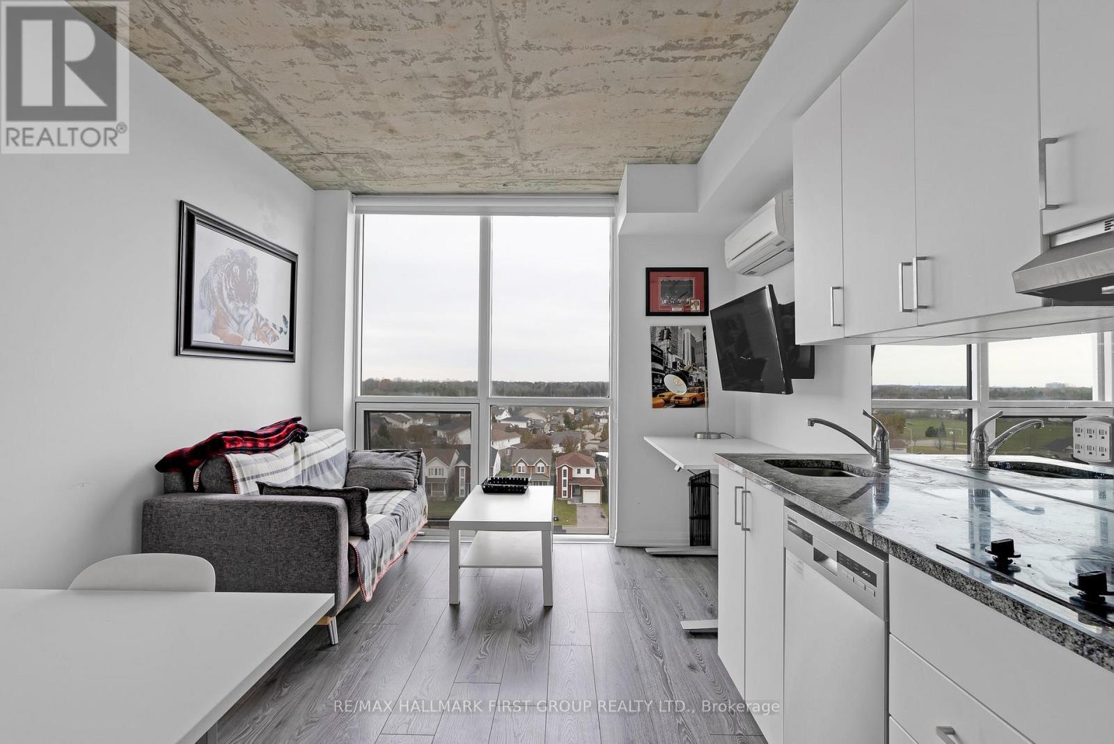 709 - 1900 Simcoe Street N, Oshawa, ON - Indoor Photo Showing Kitchen With Double Sink