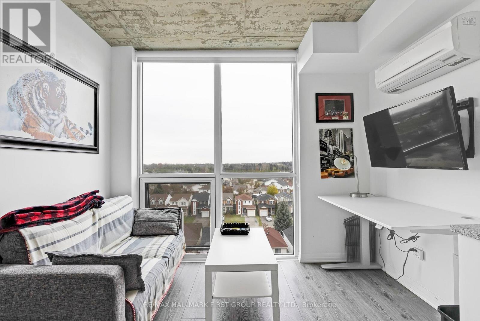 709 - 1900 Simcoe Street N, Oshawa, ON - Indoor Photo Showing Living Room