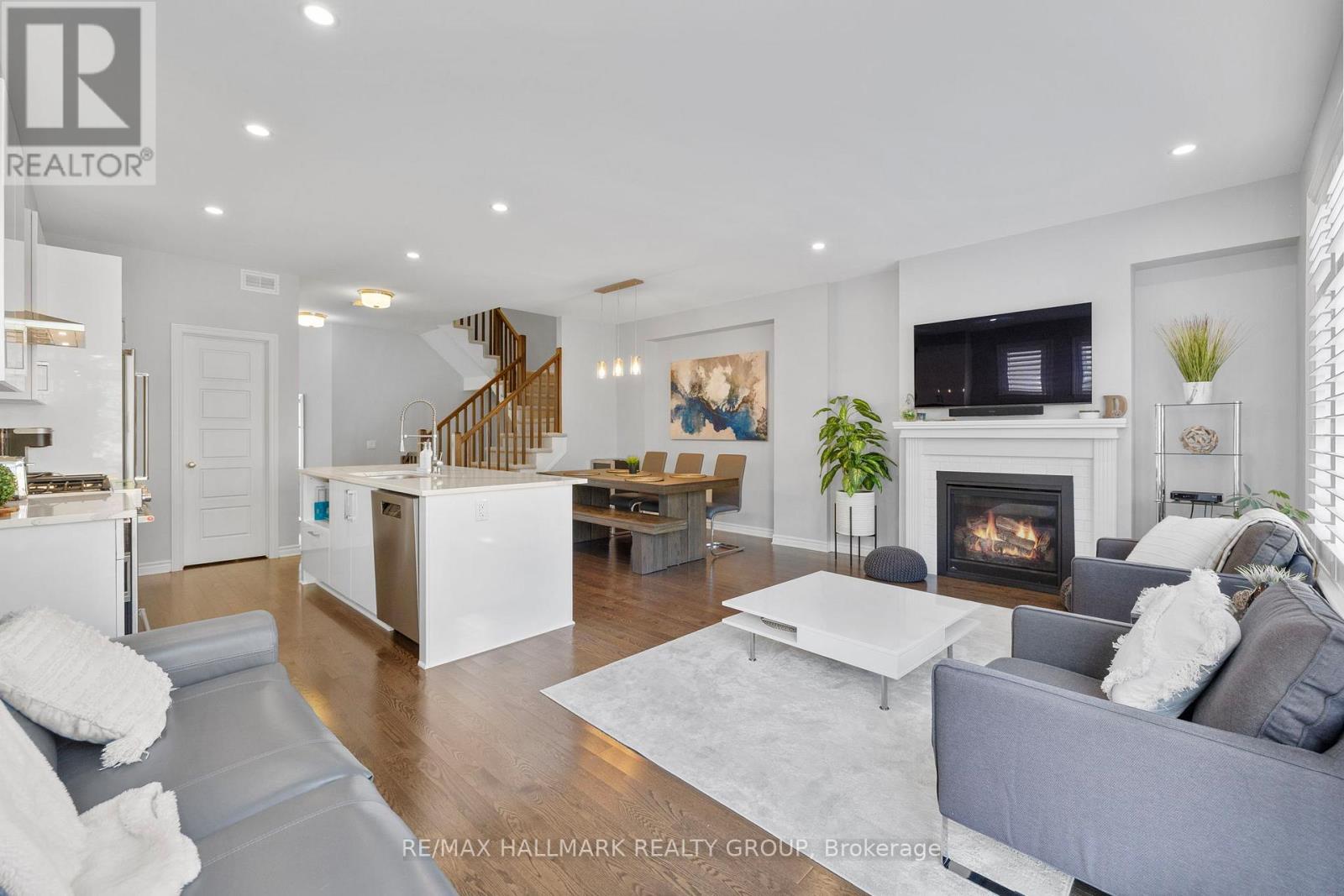 710 Rue Du Cartographe Street, Ottawa, ON - Indoor Photo Showing Living Room With Fireplace