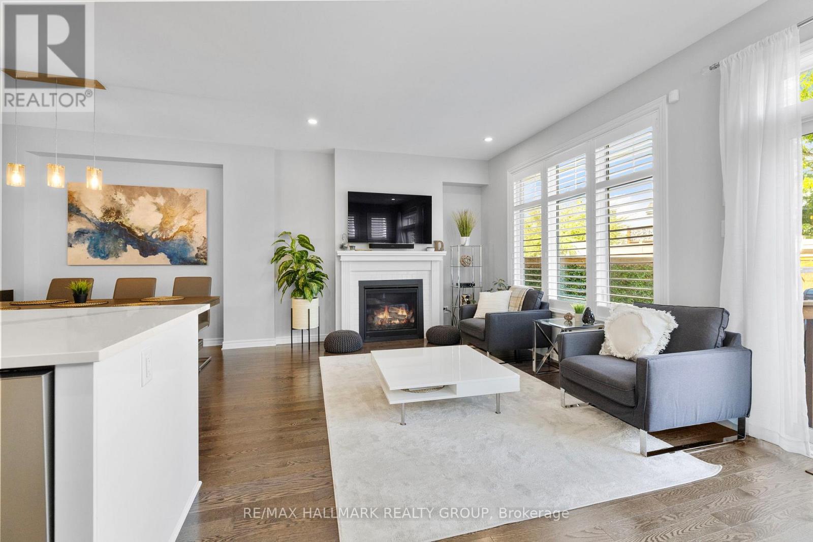 710 Rue Du Cartographe Street, Ottawa, ON - Indoor Photo Showing Living Room With Fireplace