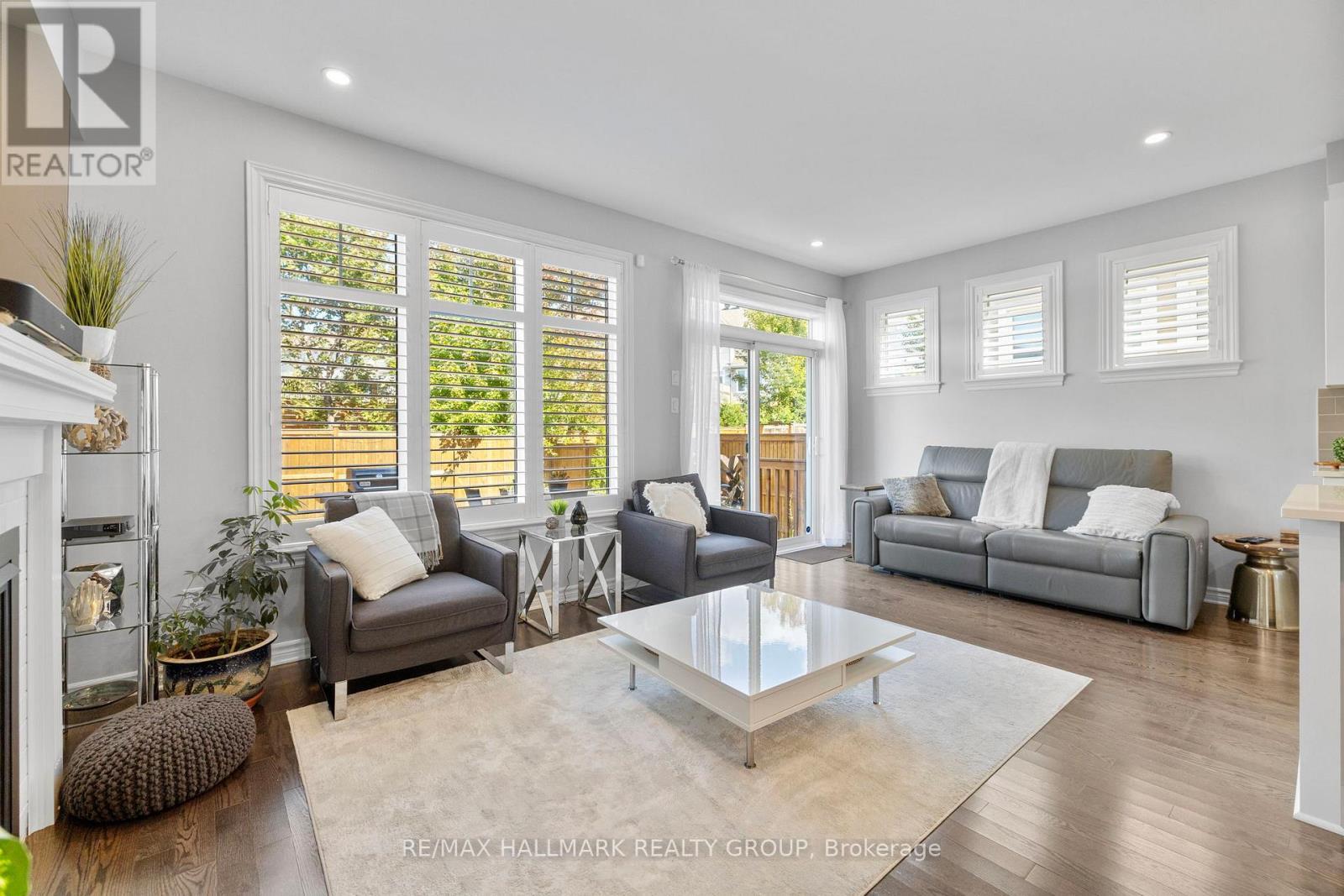 710 Rue Du Cartographe Street, Ottawa, ON - Indoor Photo Showing Living Room With Fireplace