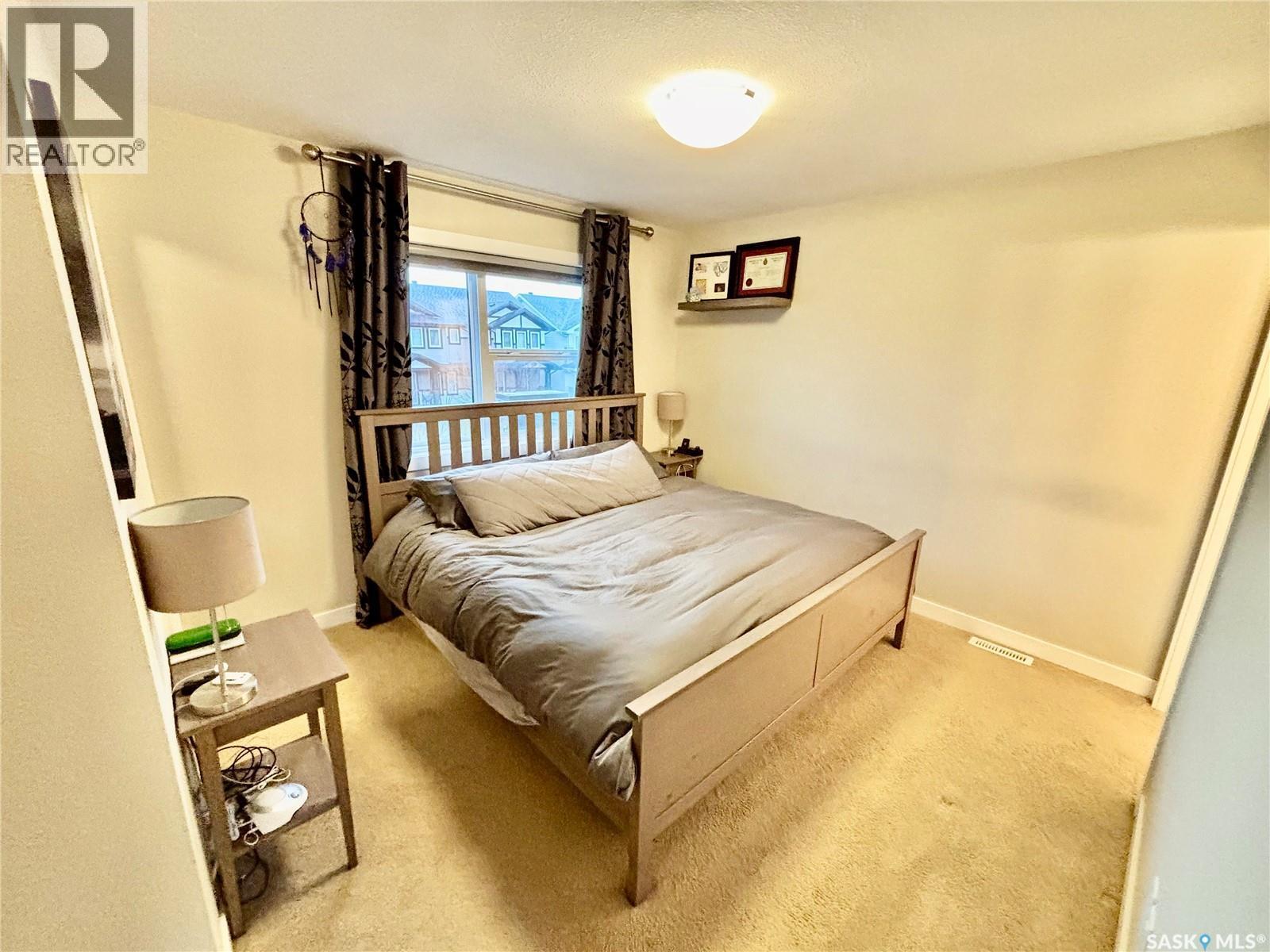 7989 Canola Avenue, Regina, SK - Indoor Photo Showing Bedroom