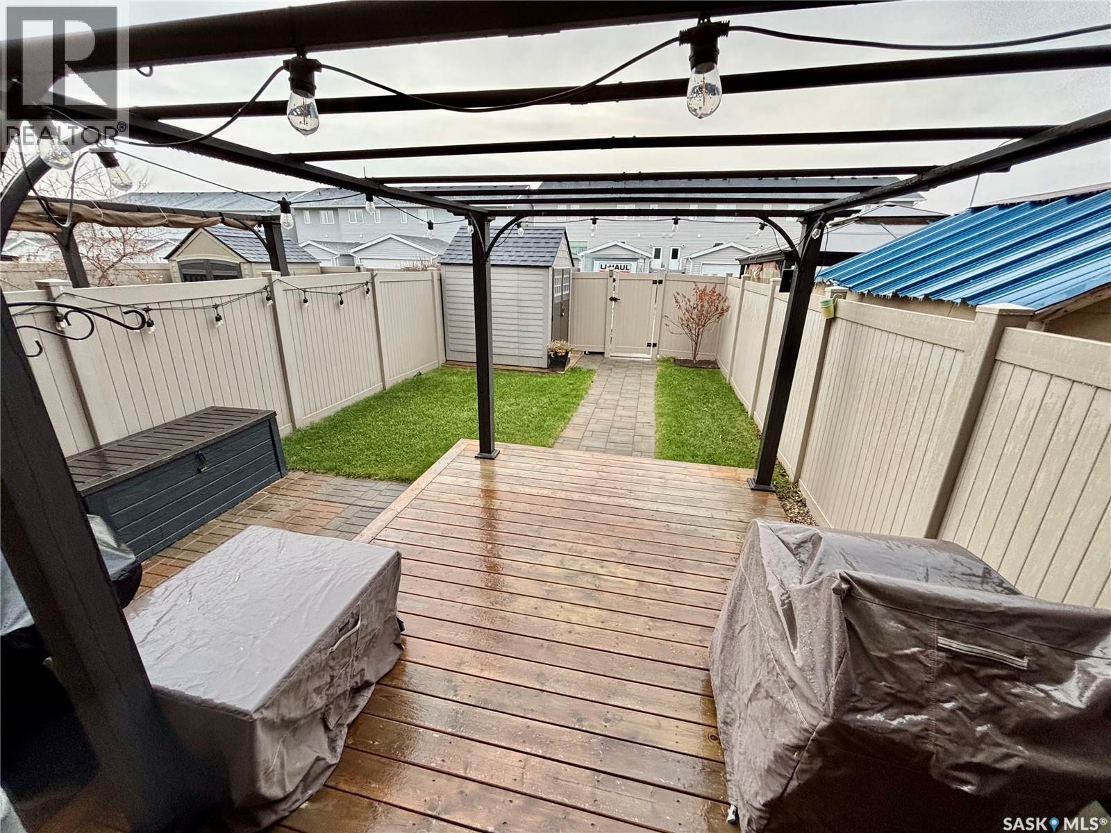7989 Canola Avenue, Regina, SK - Outdoor With Deck Patio Veranda With Exterior