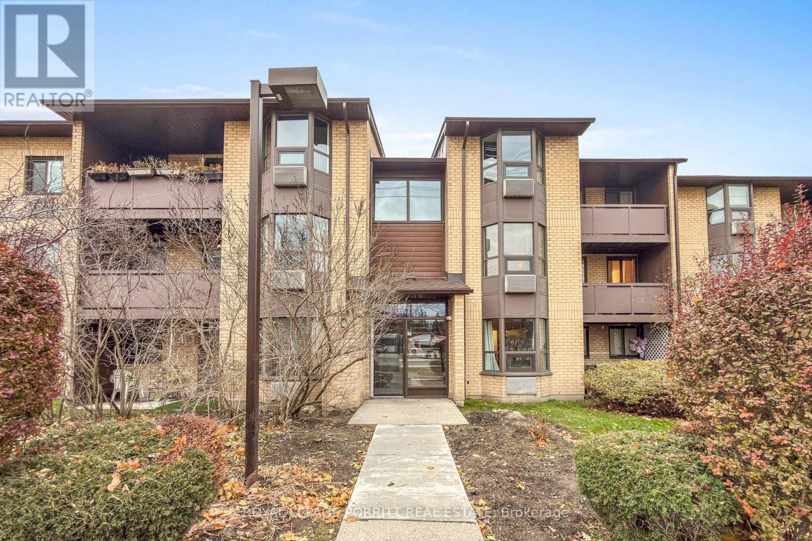 208 - 3835 Lake Shore Boulevard W, Toronto, ON - Outdoor With Balcony With Facade