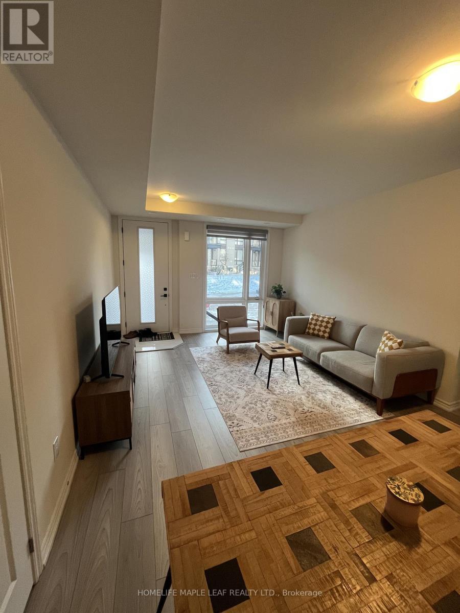 46 - 45 Knotsberry Circle, Brampton, ON - Indoor Photo Showing Living Room