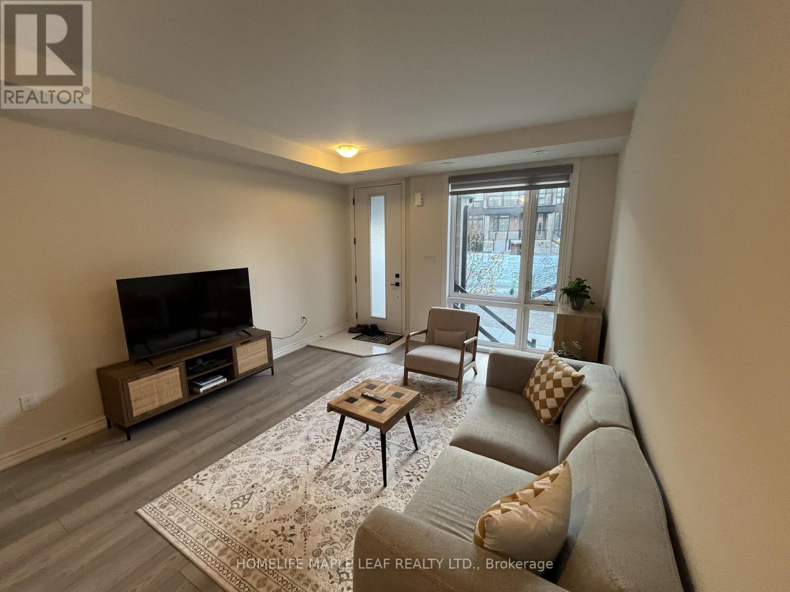 46 - 45 Knotsberry Circle, Brampton, ON - Indoor Photo Showing Living Room
