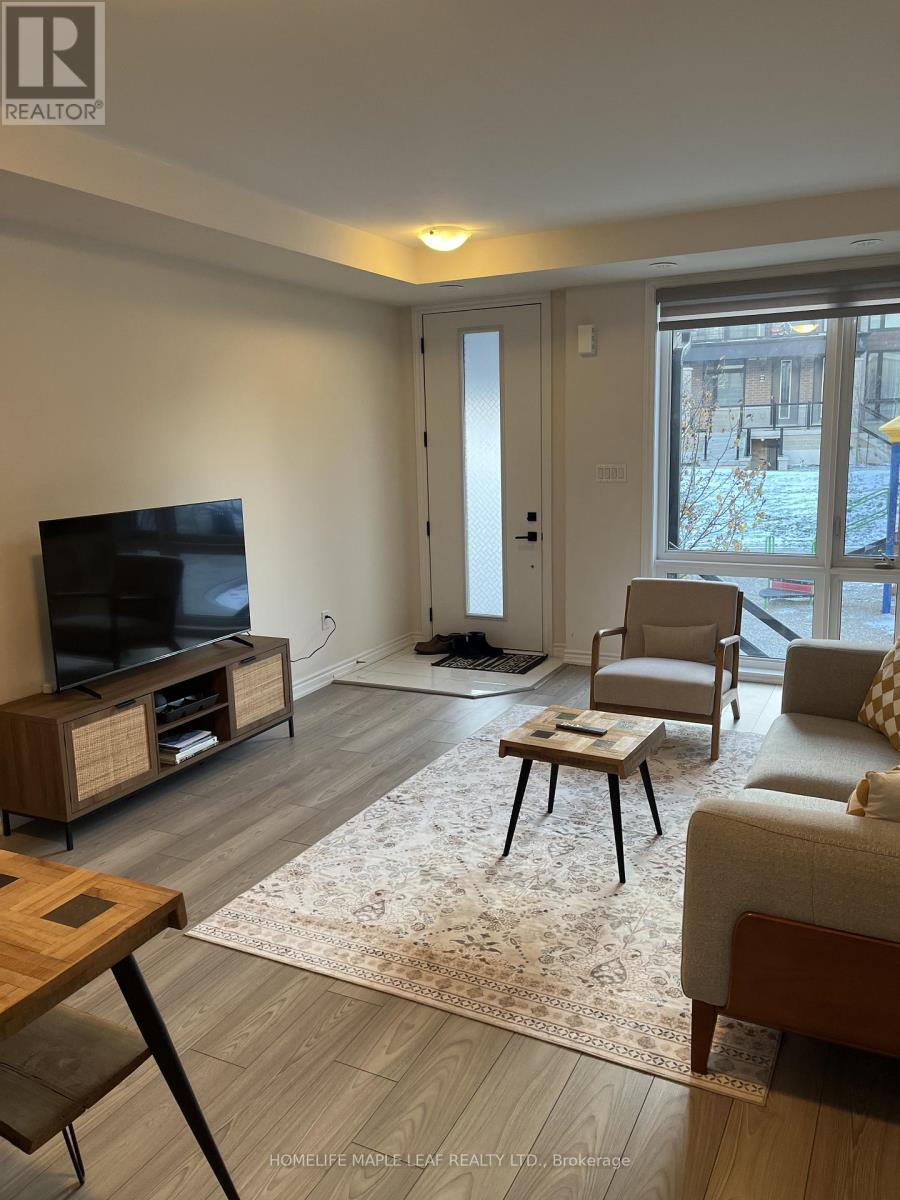 46 - 45 Knotsberry Circle, Brampton, ON - Indoor Photo Showing Living Room