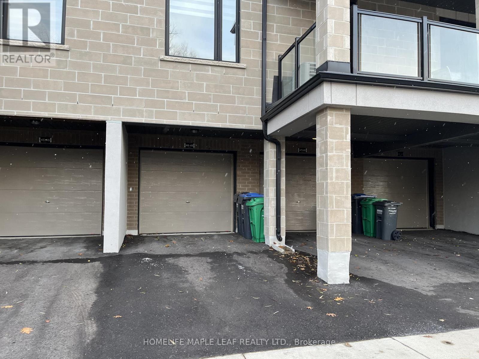46 - 45 Knotsberry Circle, Brampton, ON - Photo Showing Garage