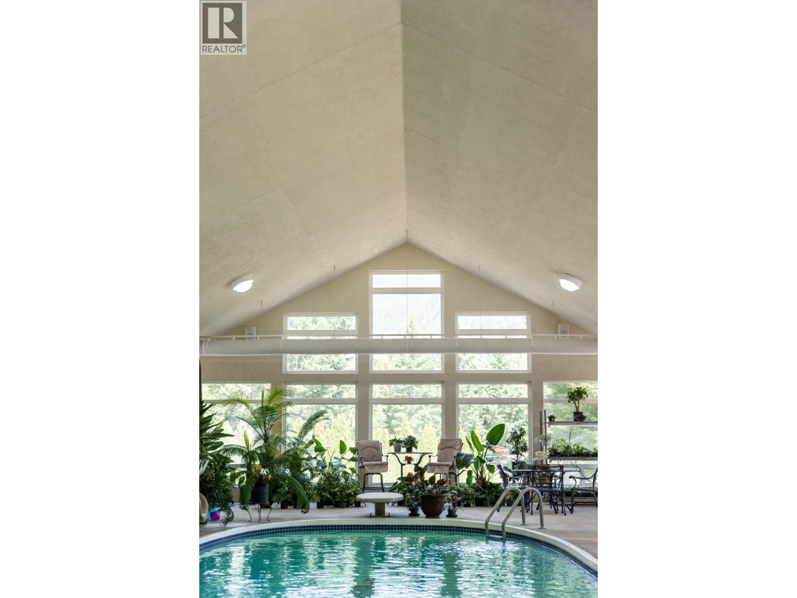 1480 Nighthawk Drive, Castlegar, BC - Indoor Photo Showing Other Room With In Ground Pool