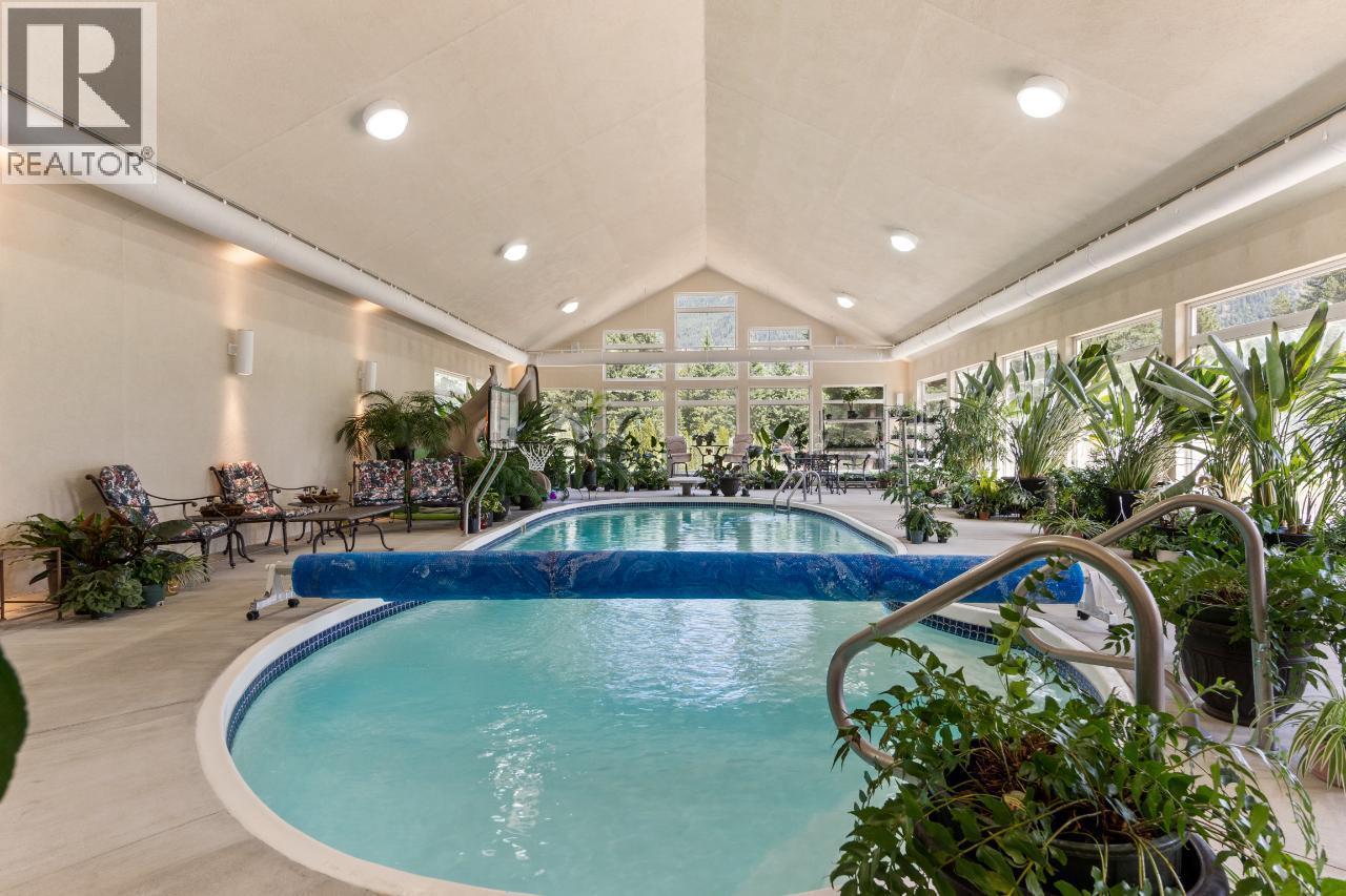 1480 Nighthawk Drive, Castlegar, BC - Indoor Photo Showing Other Room With In Ground Pool